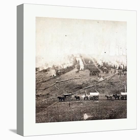 American Civil War: Three Horse-Drawn Covered Wagons in the Foreground. Soldiers Marching in Format-null-Premier Image Canvas