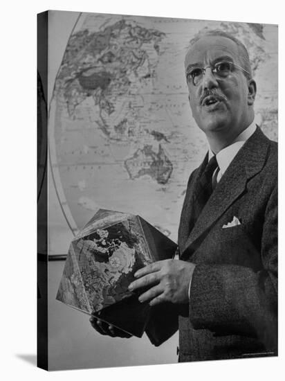 American Engineer and Architect Buckminster Fuller Holding a Globe-Andreas Feininger-Premier Image Canvas