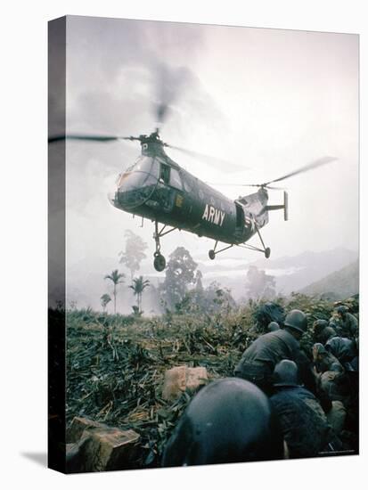 American Helicopter H-21 Hovering Above Soldiers in Combat Zone During Vietnam War-Larry Burrows-Premier Image Canvas