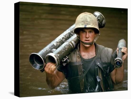 American Marine Pfc. Phillip Wilson Carrying Bazooka Across Stream Near DMZ During Vietnam War-Larry Burrows-Premier Image Canvas