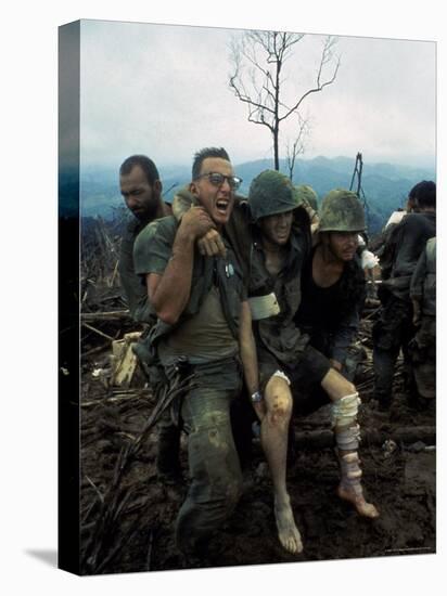 American Marines Aid a Wounded Comrade During Intense Battle for Hill 484-Larry Burrows-Premier Image Canvas