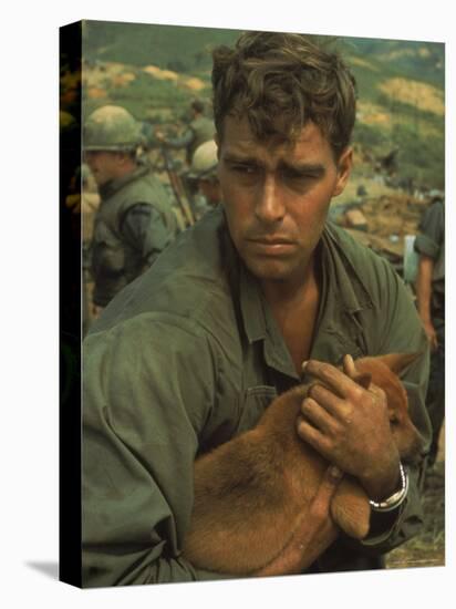American Soldier Cradling Dog While under Siege at Khe Sanh-Larry Burrows-Premier Image Canvas