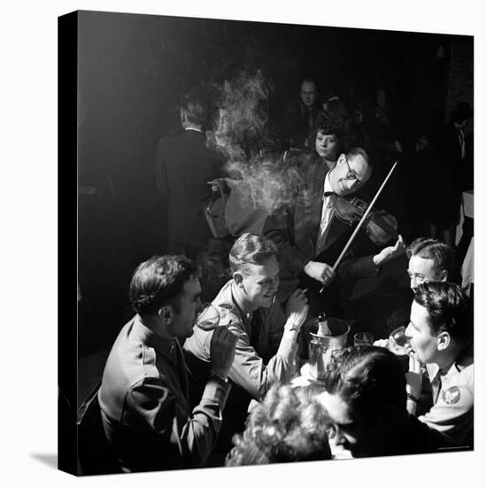 American Soldiers Drinking Champagne and Listening to Violinist at Nightclub "La Parisana."-George Silk-Premier Image Canvas