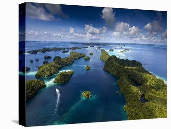 An Aerial View of a Boat as it Speeds Through the Rock Islands, Republic of Palau.-Ian Shive-Premier Image Canvas