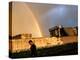 An Afghan Man Walks Past Destroyed Buildings Occupied by Refugees after a Heavy Rain-null-Premier Image Canvas