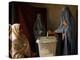 An Afghan Woman Wearing a Burqa Casts Her Ballot at a Polling Station-null-Premier Image Canvas