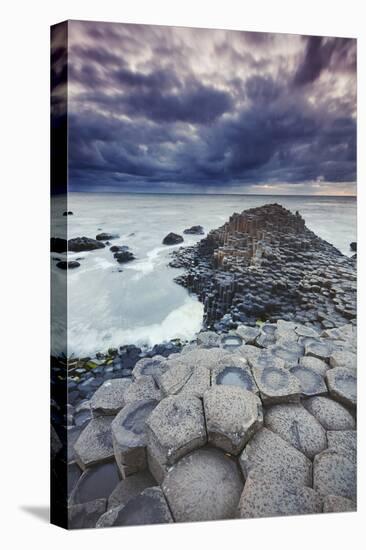 An evening view of the Giant's Causeway, UNESCO World Heritage Site, County Antrim, Ulster, Norther-Nigel Hicks-Premier Image Canvas