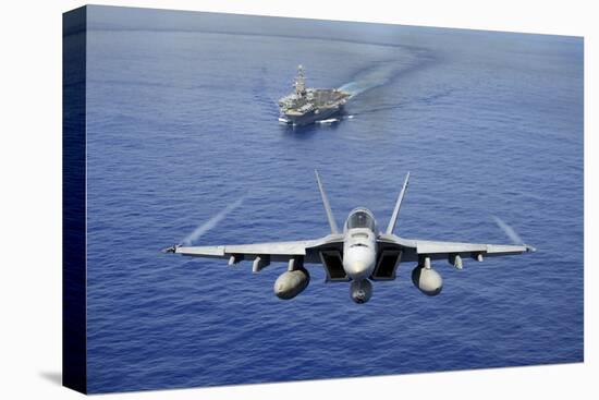 An F-A-18E Super Hornet Flying Above USS John C. Stennis-null-Premier Image Canvas