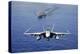 An F-A-18E Super Hornet Flying Above USS John C. Stennis-null-Premier Image Canvas
