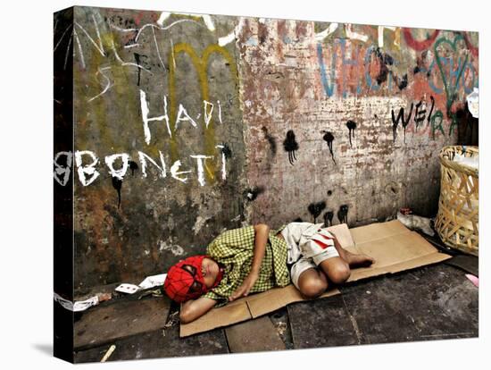 An Indonesian Boy Wearing a Spiderman Mask Sleeps on a Piece of Cardboard-Ed Wray-Premier Image Canvas