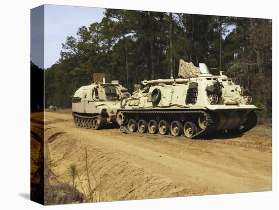 An M-88 Recovery Vehicle Begins to Tow an M992 Field Artillery Ammunition Supply Vehicle-Stocktrek Images-Premier Image Canvas