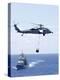 An Mh-60S Sea Hawk Helicopter Flying in Front of USS Gettysburg-null-Premier Image Canvas