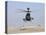 An Oh-58D Kiowa Warrior Hovers over the Flight Line at Camp Speicher, Iraq-null-Premier Image Canvas