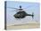 An Oh-58D Kiowa Warrior Hovers over the Flight Line at Camp Speicher, Iraq-null-Premier Image Canvas