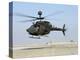 An Oh-58D Kiowa Warrior Hovers over the Flight Line at Camp Speicher, Iraq-null-Premier Image Canvas