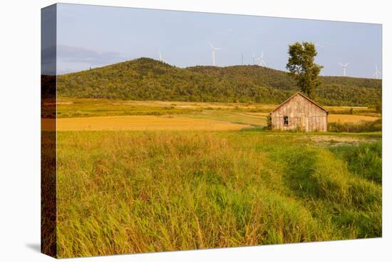 An Old Farm Building in a Field Next to the Mars Hill Wind Farm in Mars Hill, Maine-Jerry and Marcy Monkman-Premier Image Canvas