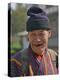 An Old Man at Trashigang Wearing the Traditional Gho Robe of All Bhutanese Men-Nigel Pavitt-Premier Image Canvas