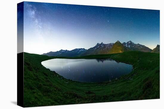 Andossi lake lit by glowing stars in the night sky, Madesimo, Valle Spluga, Valtellina, Lombardy-Roberto Moiola-Premier Image Canvas