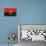 Angola Flag Design with Wood Patterning - Flags of the World Series-Philippe Hugonnard-Stretched Canvas displayed on a wall