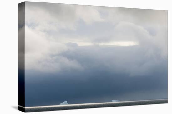 Antarctica. Bransfield Strait. Iceberg under Stormy Skies-Inger Hogstrom-Premier Image Canvas