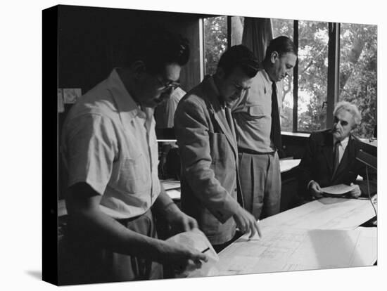 Architect Richard Neutra Going over Designs with Staff-Ed Clark-Premier Image Canvas