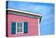 Architecture Detail of a Pink House with Blue Shuttered Window against Blue Sky-pink candy-Premier Image Canvas