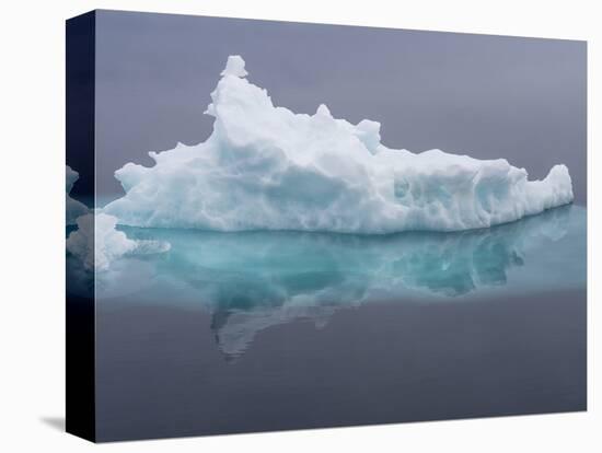 Arctic Ocean, Norway, Svalbard. Iceberg Reflects in Ocean-Jaynes Gallery-Premier Image Canvas