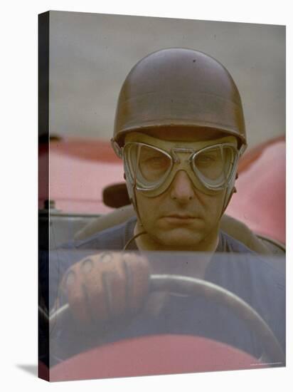 Argentine Auto Racer Juan Manuel Fangio Sitting at Wheel of Race Car at Las Mans-Howard Sochurek-Premier Image Canvas