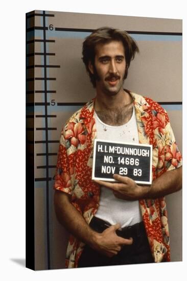 Arizona Junior RAISING ARIZONA by Joel Coen and Ethan Coen with Nicolas Cage, 1987 (photo)-null-Stretched Canvas