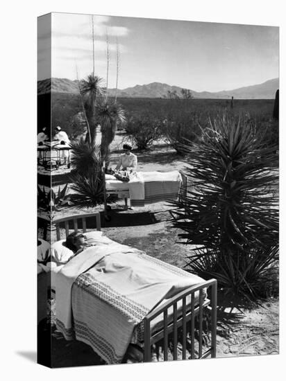 Arthritis Patients Being Tended to by Nurses as They Undergo Sunbathing Treatment at Desert Clinic-Alfred Eisenstaedt-Premier Image Canvas