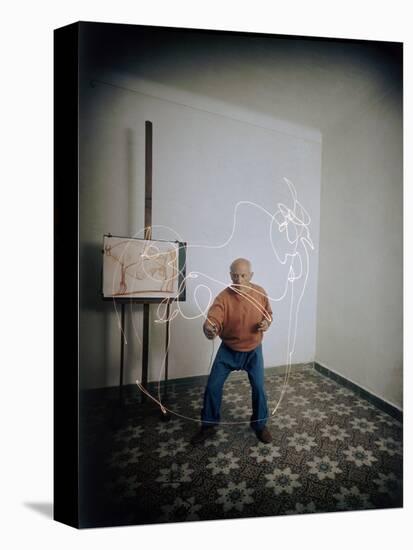 Artist Pablo Picasso Attempting to Draw a Minotaur Using Light Pen, Vallauris, France, 1949-Gjon Mili-Premier Image Canvas