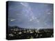 Artwork of Meteor Shower Over a City-Chris Butler-Premier Image Canvas