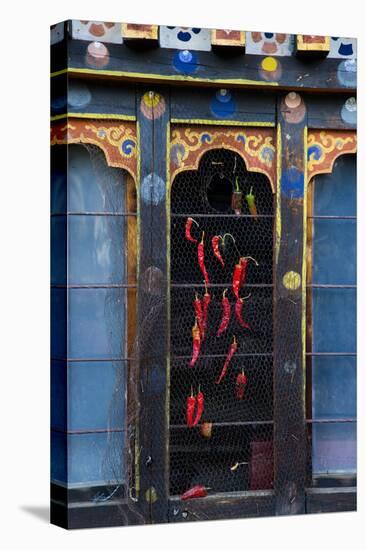 Asia, Bhutan, Haa Valley, Chili Peppers. Chili Peppers Drying in Windows-Ellen Goff-Premier Image Canvas