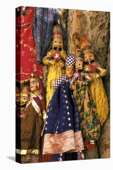 Asia, India, Amber. Paper mache puppets.-Claudia Adams-Premier Image Canvas