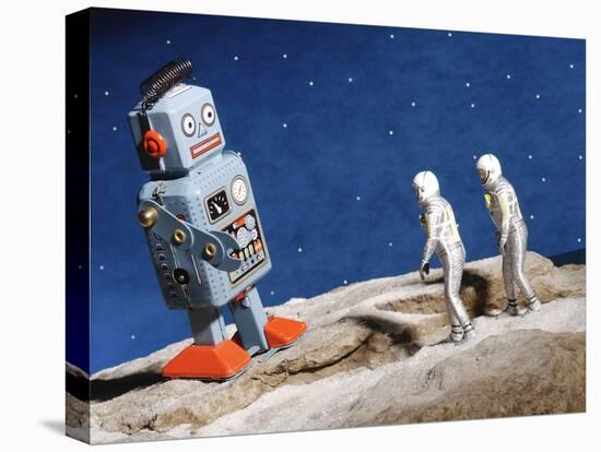 Astronaut Figurines Standing Beside Gray Toy Rocket-null-Premier Image Canvas