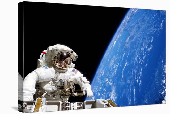 Astronaut Performing a Spacewalk-null-Premier Image Canvas