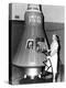 Astronaut Trainees Jerrie Cobb Stands Next to a Mercury Spaceship Capsule-null-Stretched Canvas