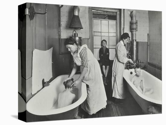 Attendants bathing boys at the Central Street Cleansing Station, London, 1914-Unknown-Premier Image Canvas
