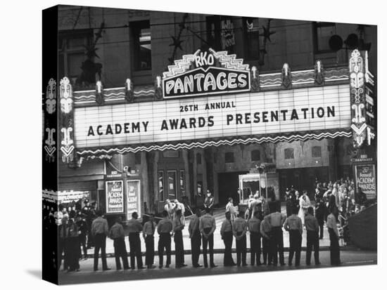Attendants in Front of Pantages Theater Await Celebrities to Arrive for 26th Annual Academy Awards-George Silk-Premier Image Canvas