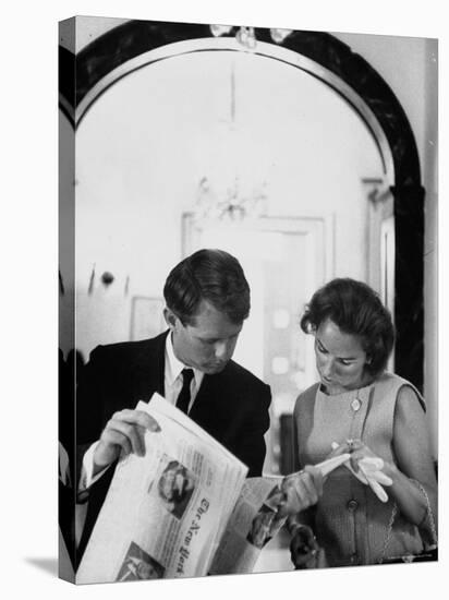 Attorney General Robert Kennedy and Wife Looking at Copy of the New York Times-George Silk-Premier Image Canvas