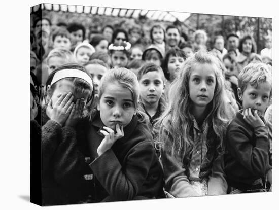 Audience of Children Sitting Very Still, with Rapt Expressions, Watching Puppet Show at Tuileries-Alfred Eisenstaedt-Premier Image Canvas