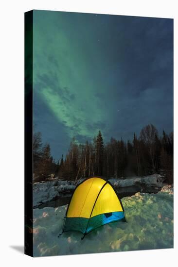 Aurora borealis, Northern Lights, and illuminated tent near Fairbanks, Alaska-Stuart Westmorland-Premier Image Canvas