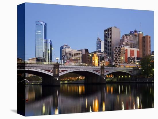 Australia, Victoria, Melbourne; Princes Bridge on the Yarra River, with the City Skyline at Dusk-Andrew Watson-Premier Image Canvas