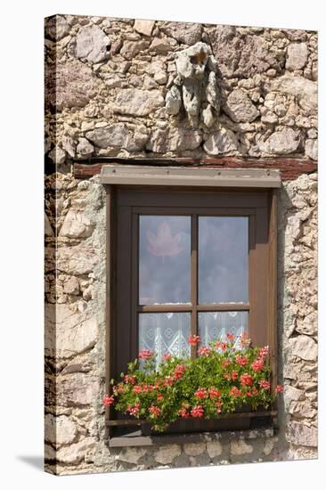 Austria, Tyrol, window of alpine hut with geraniums.-Roland T. Frank-Stretched Canvas