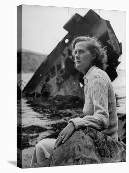 Author Daphine du Maurier Sitting by a Wrecked Ship-Hans Wild-Premier Image Canvas