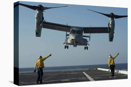 Aviation Boatswain's Mates Direct an MV-22 Osprey as it Launches from the Flight Deck-null-Premier Image Canvas