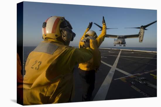 Aviation Boatswain's Mates Direct an MV-22 Osprey on the Flight Deck-null-Premier Image Canvas