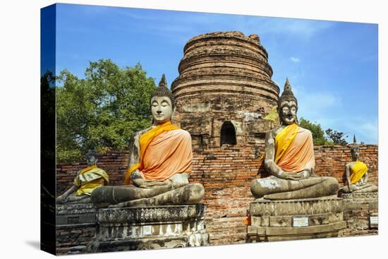 Ayutthaya, Thailand. Large Buddha at Wat Phra Mahathat, Ayutthaya Historical Park, near Bangkok.-Miva Stock-Premier Image Canvas