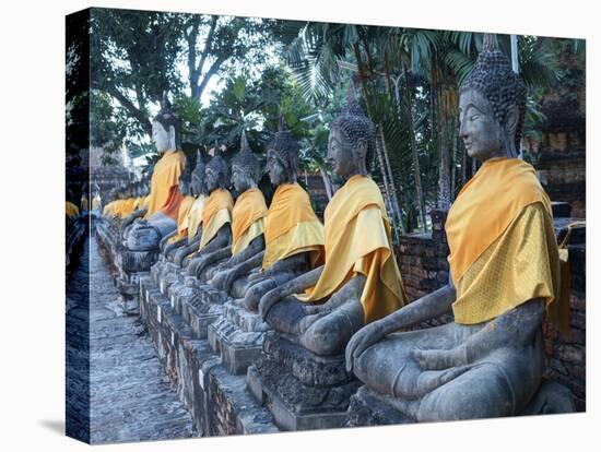 Ayutthaya Wat Yai Chai Mongkol Row of Buddha Statues-Terry Eggers-Premier Image Canvas