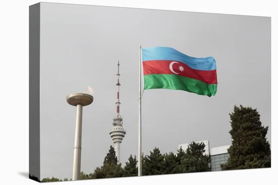 Azerbaijan, Baku. an Azerbaijan Flag Waves Near a Memorial Flame and the Baku Tv Tower-Alida Latham-Premier Image Canvas